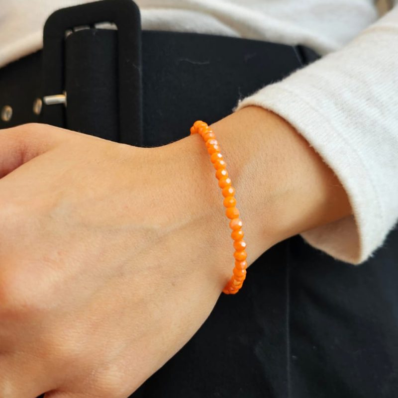 Pulsera elastizada de cristal roca naranja claro